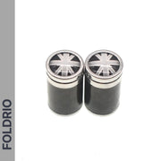 Two black FOLDRIO containers with metallic Union Jack lids sit side by side on a white background. Perfect for storing Brompton Union Jack Valve Caps – Schrader (A/C/G Line). "FOLDRIO" is printed vertically on the left container.