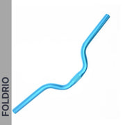 The Brompton M Handlebar – Anodised Aluminium (Blue), featuring a slight rise and bend for upright riding, is shown on a white background with "FOLDRIO" vertically on a grey strip at the left.
