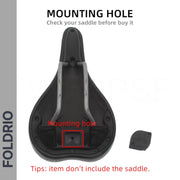 Image of the Brompton AirTag Saddle Mount – Hidden Tracker Holder shown beside a bicycle saddle, with the central mounting hole highlighted in red. Text notes that the saddle is not included.
