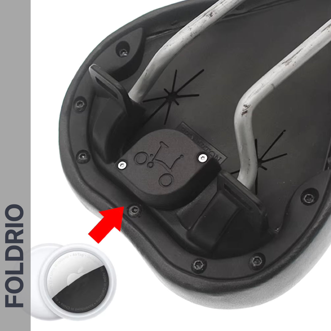 Close-up of the Brompton AirTag Saddle Mount – Hidden Tracker Holder installed under a bike saddle. A red arrow highlights its location, with FOLDRIO vertically on the left—ideal for anti-theft bike tracking.