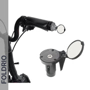 A close-up shows a Brompton Bar End Mirror – 360° Adjustable, Foldable, mounted on a bicycle handlebar with its compact convex shape and foldable base. An inset details the adjustment mechanism. The word FOLDRIO appears on the left side.