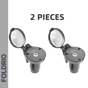 Two Brompton Bar End Mirrors—360° adjustable and foldable in black—are displayed side by side with open reflective lids on a white background. Large text above reads "2 PIECES," and the left gray bar shows "FOLDRIO.