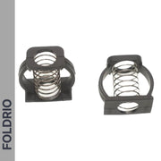 Two Brompton Stem Fixing Buckle Springs by FOLDRIO are shown encased in black rectangular plastic frames on a white background, with "FOLDRIO" written vertically on a gray sidebar to the left.