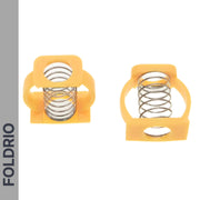 Two yellow plastic and metal Brompton Stem Fixing Buckle Springs by FOLDRIO are displayed on a white background—one upright, one on its side. Ideal for hinge clamp alignment. The FOLDRIO brand name appears vertically on the left.