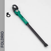A FOLDRIO Brompton Kickstand – Carbon Fibre, P and T Line, shown with a mounting bracket and bolt on a white background. FOLDRIO is displayed vertically on a gray sidebar to the left.