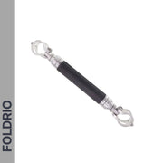 A Brompton M Handlebar Cross Brace by FOLDRIO, shown diagonally on a white background, features clamp-style connectors at both ends. The adjustable cylindrical bar is part of a 6-colour range, with "FOLDRIO" vertically on a gray left sidebar.