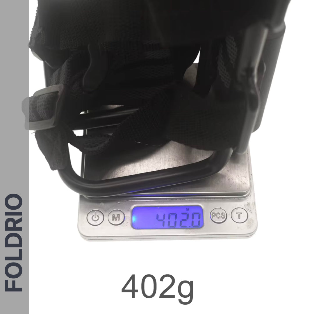 A FOLDRIO Brompton Front Bag Rack Holder with Elastic Straps, in black, is shown on a digital scale reading 402g, with the brand name FOLDRIO on the left and "402g" displayed below.