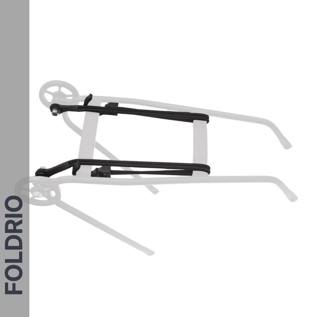 A black FOLDRIO Brompton Rear Rack Elastic Strap, designed for AC Line (old) & PT Line (new), is shown on a white background attached to a folding cart frame with two wheels. "FOLDRIO" appears vertically along a gray bar on the image's left side.