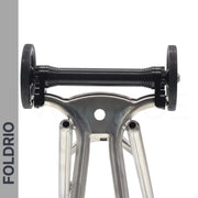 Brompton Brompton Easy Wheel & Extension Rod Set features two alloy wheels, black axle, and "FOLDRIO" logo on gray | Foldrio. Foldrio