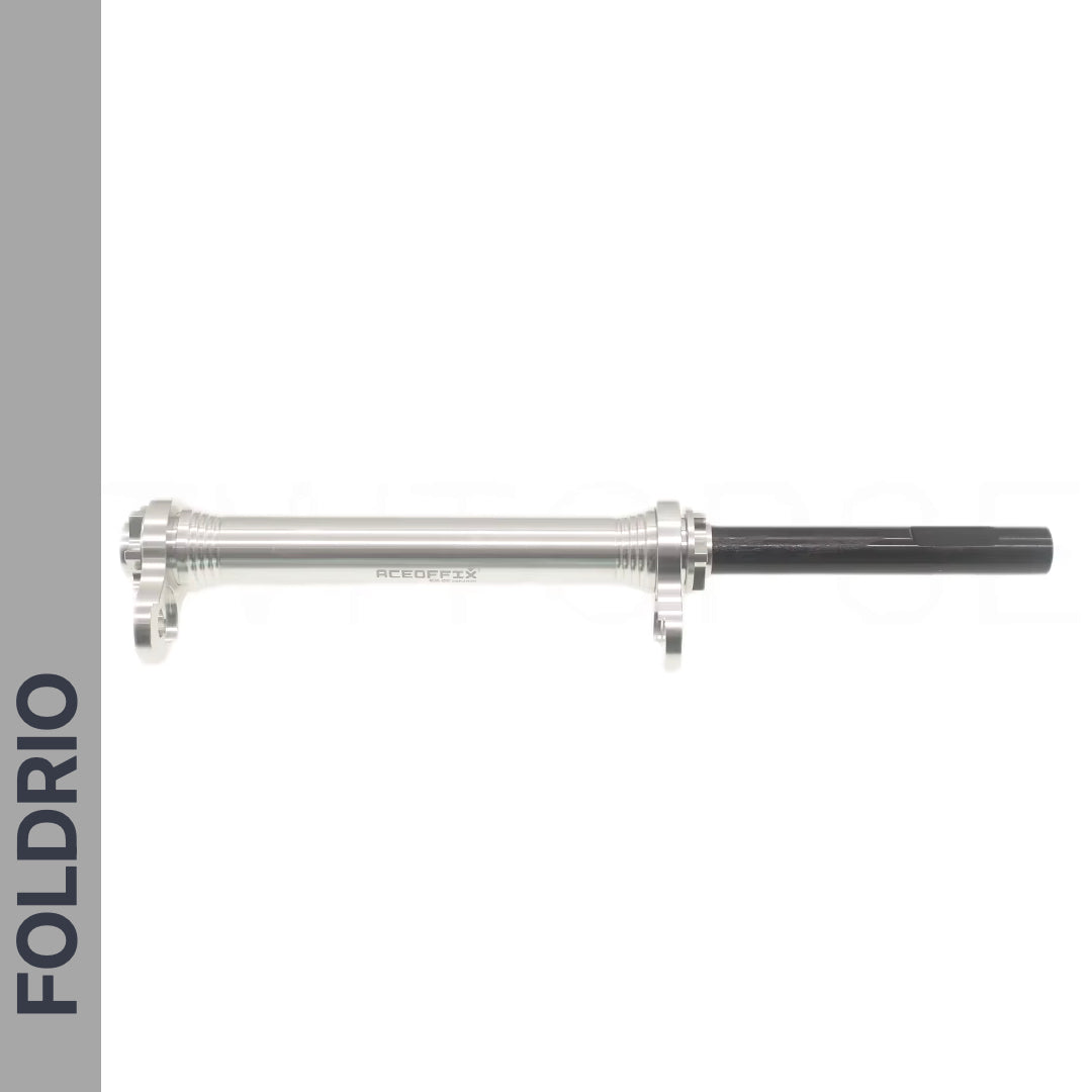 Brompton Brompton Easy Wheel & Extension Rod Set on white, with FOLDRIO branding in bold black on a vertical gray bar | Foldrio. Foldrio