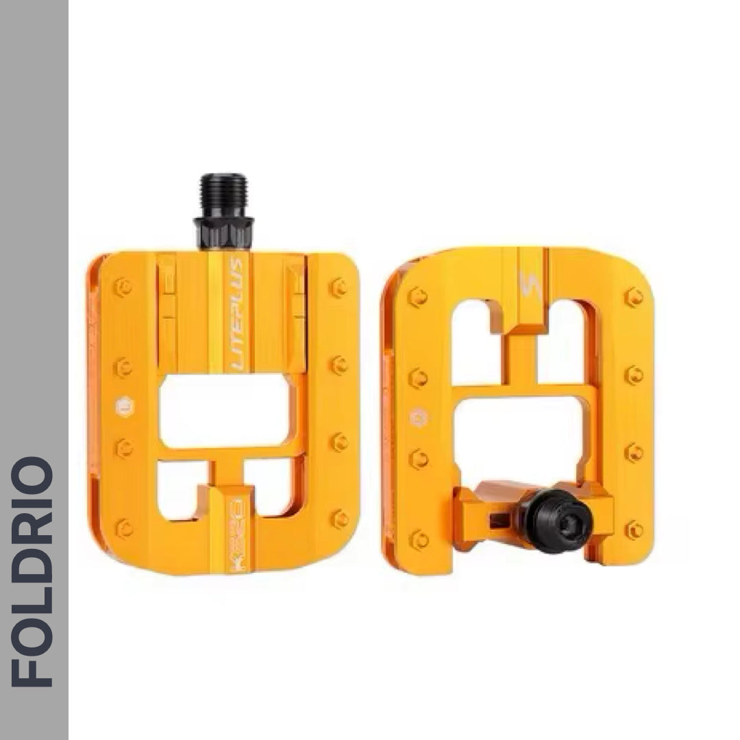 Two orange Brompton Foldable Flat Pedals – Lightweight Aluminium Upgrade with a rectangular open-frame design are shown side by side on a white background, ideal for Brompton enthusiasts. The "FOLDRIO" brand name appears vertically on the left.